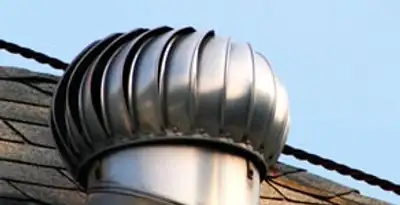 attic fan installation services with professionally installed roof ventilation unit in Flagstaff, AZ