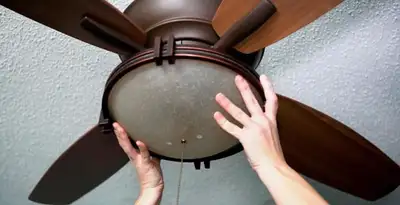 Ceiling fan repair and reinstallation on ceiling mount in Flagstaff, AZ