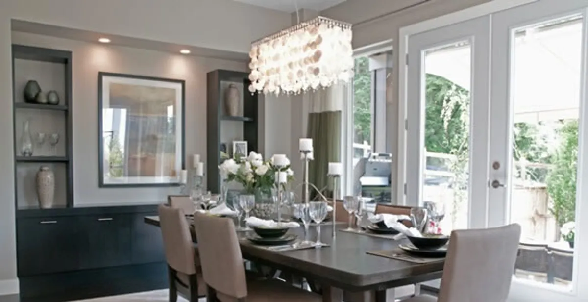 Elegant dining room chandelier installation above table in Flagstaff, AZ