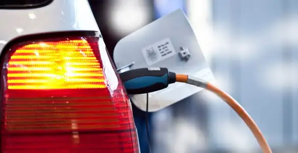 Electric car plugged into EV charger after professional installation in Flagstaff, AZ