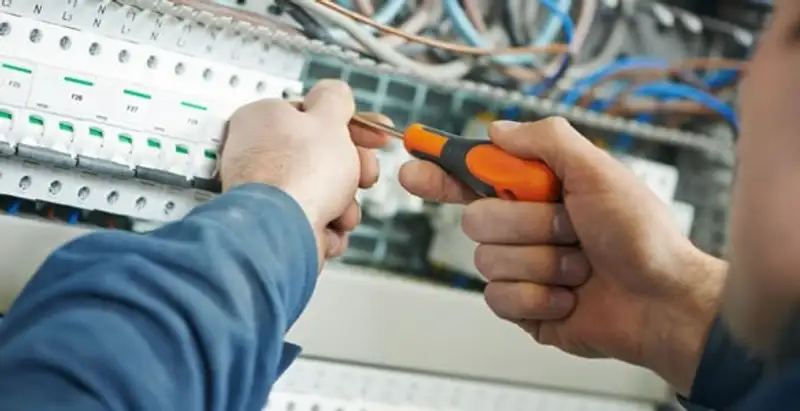 electrical service showing licensed electrician performing electrical panel maintenance and adjustments in Flagstaff, AZ