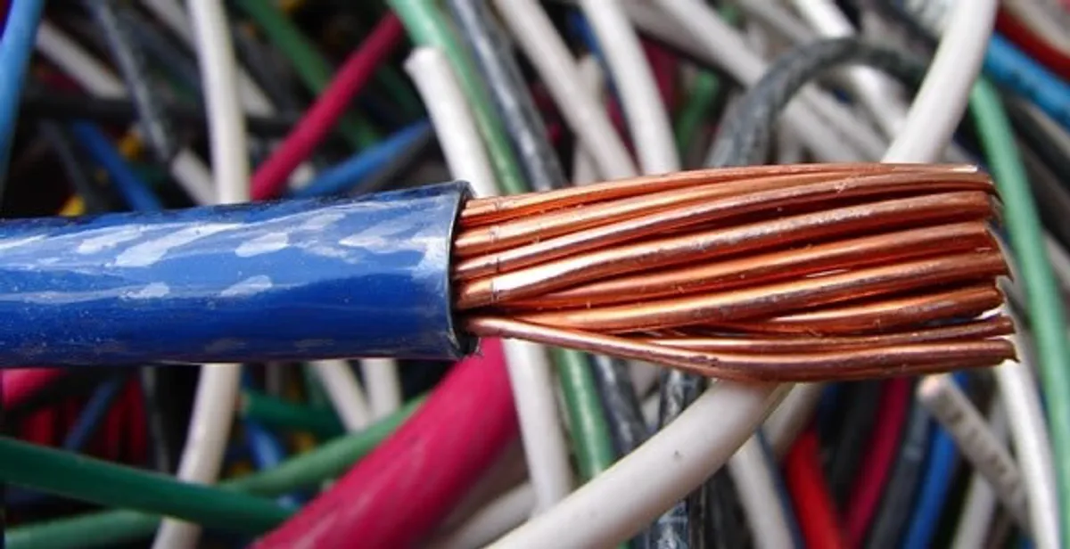 electrical wiring services showing exposed copper conductors and cable preparation in Flagstaff, AZ