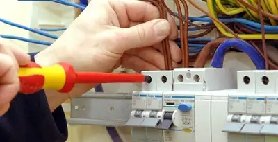 electrician services performing professional electrical panel wiring and connections in Flagstaff, AZ