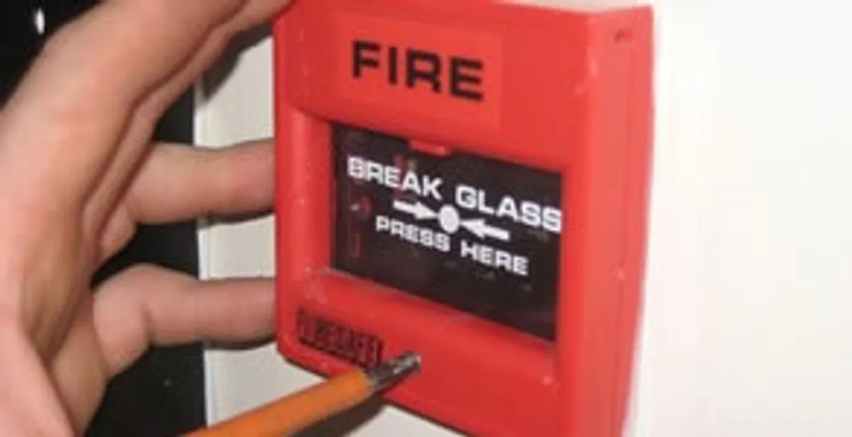 fire alarm installation service showing manual fire alarm pull station installed by licensed electricians in Flagstaff, AZ