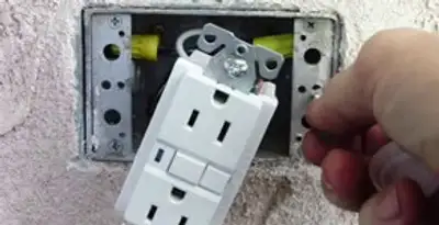 gfci circuits service showing installation of a ground fault circuit interrupter outlet by licensed electricians in Flagstaff, AZ