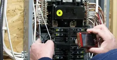Home electrical inspection of circuit breaker panel by licensed electrician in Flagstaff, AZ