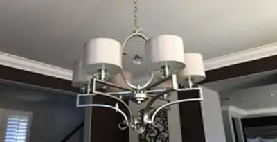 Modern chandelier installation with multiple light fixtures in Flagstaff, AZ