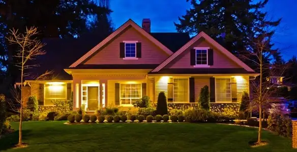 security light installation services illuminating a residential exterior at night in Flagstaff, AZ