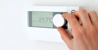 Thermostat installation service with professional adjusting temperature control in Flagstaff, AZ