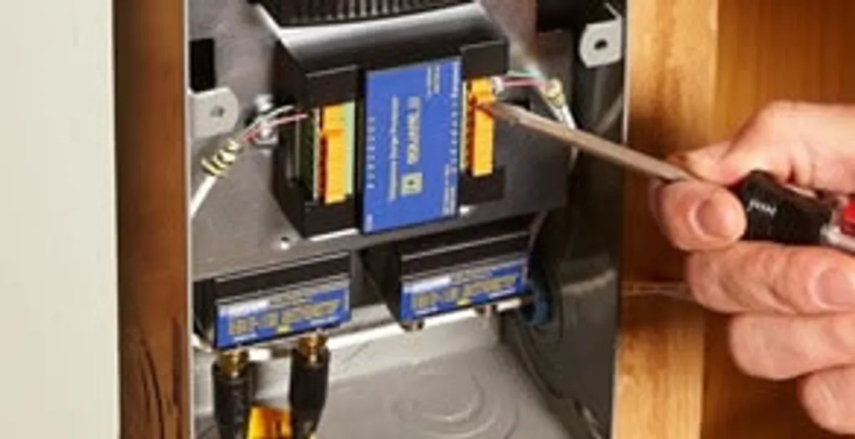 Whole home surge protection device being installed by a licensed electrician to protect electrical systems in Flagstaff, AZ